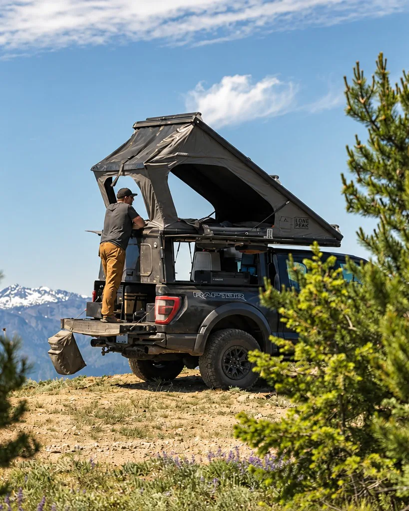 Lone Peak Overland camper on a pickup truck on a mountain ridge